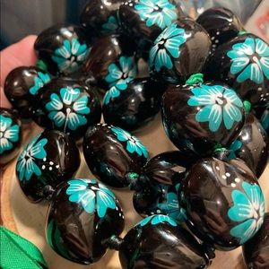 Handmade Kukui Nut 🌰 Lei with Black/Green Ribbon.